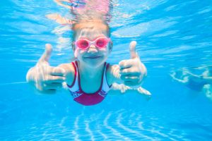 Kids Swimming in Pool